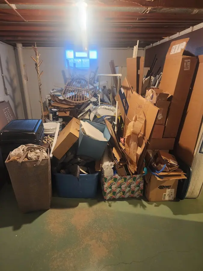 Roll-off dumpster container at job site for Yard Waste Dumpster Rental in Heavener